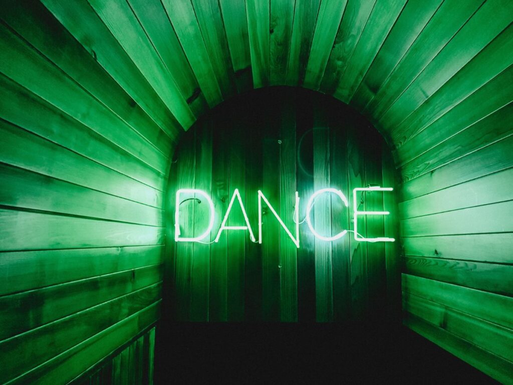 Dance class sign in Neon