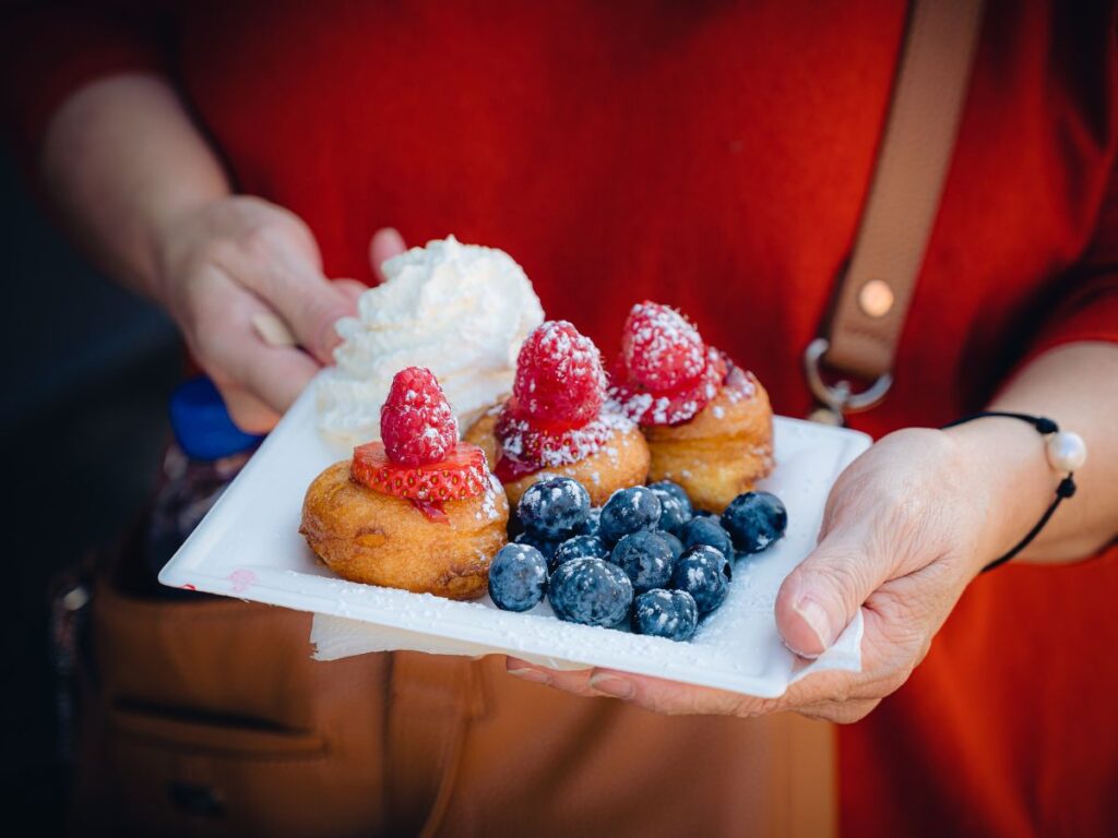 blueberries and strawberry on donuts for dessert take away in Toronto