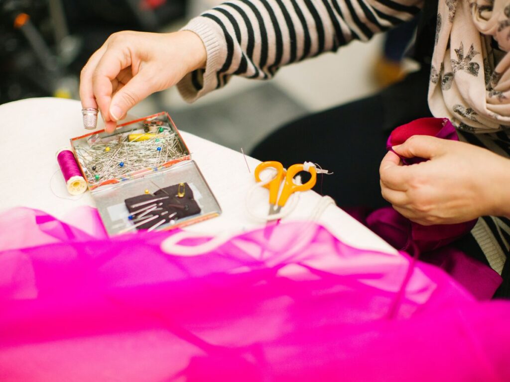 Girl working in a sewing class in Toronto