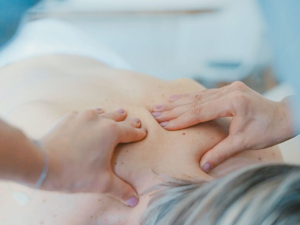 chiropractor using hands to treat patient in toronto