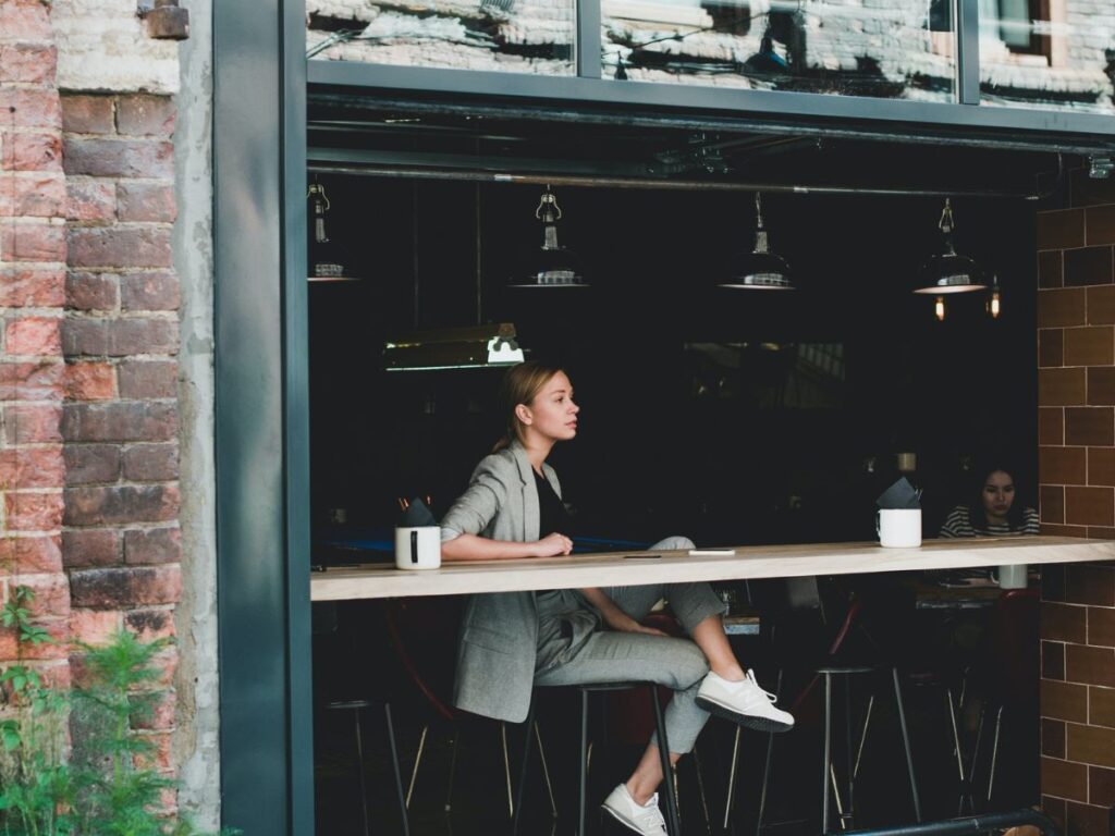 girl sitting in a coffee shop