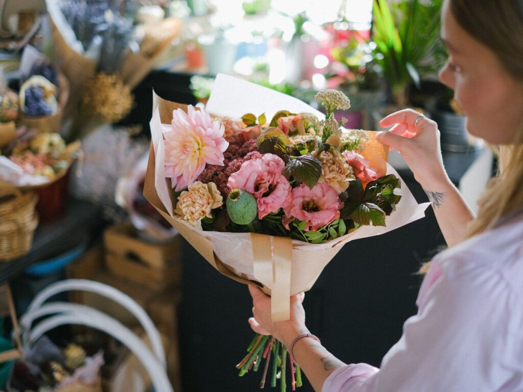 florist checking flowers i ntoronto 