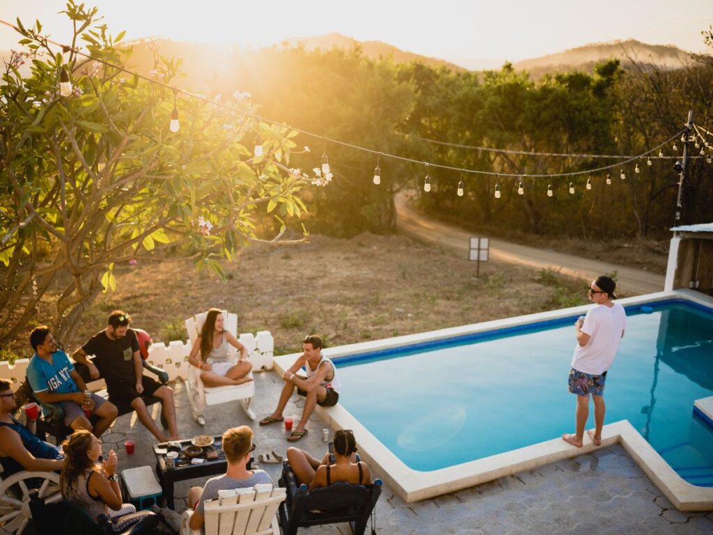 People mingling to make new friends near poolside in Toronto