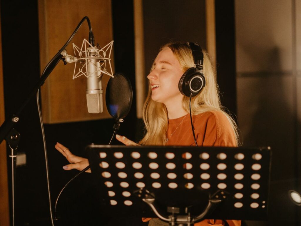 girl singing in studio