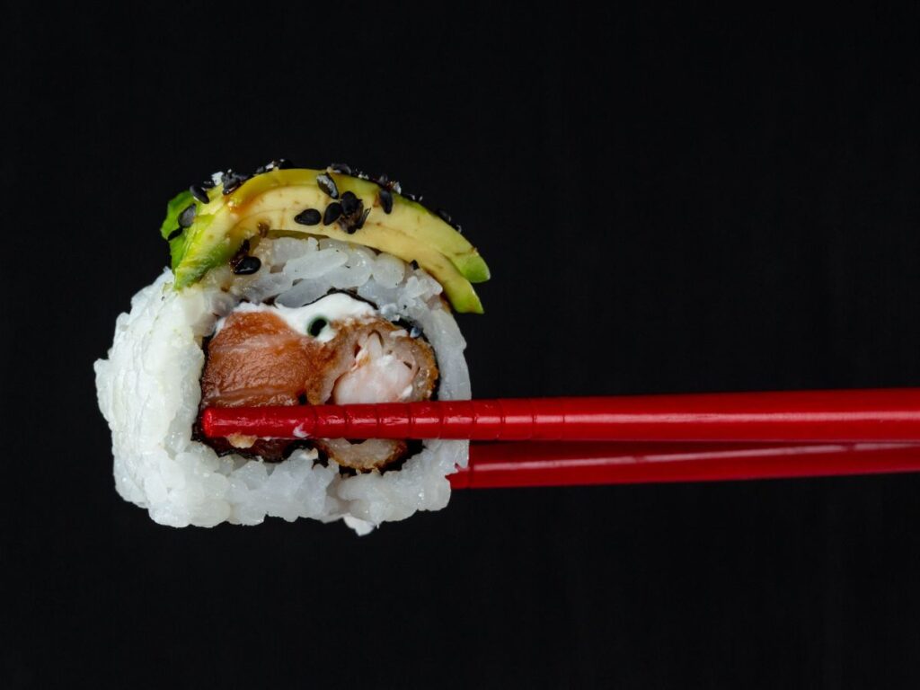 sushi with chopsticks