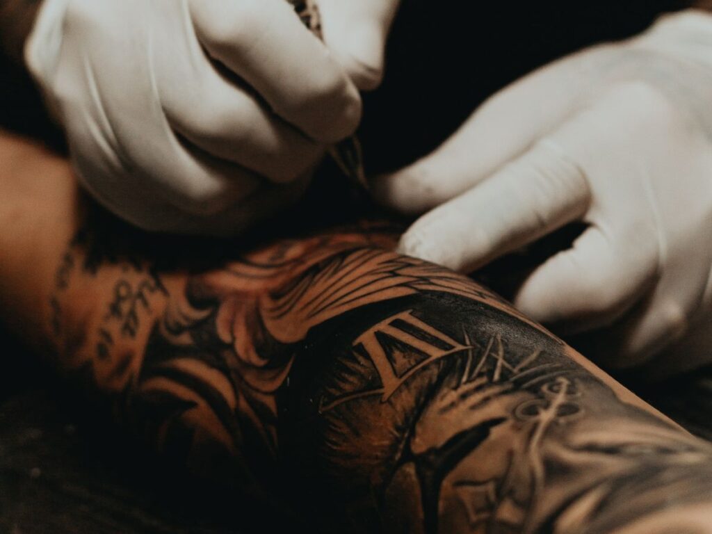 closeup of tattoo making session