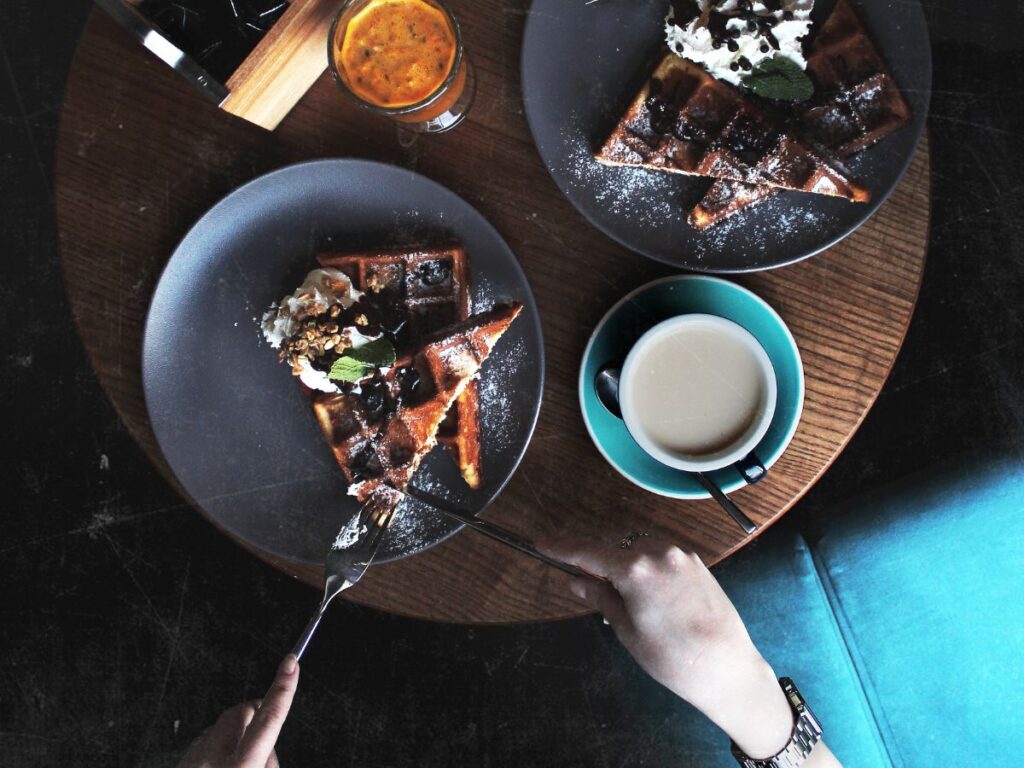 people eating waffles in toronto cafe