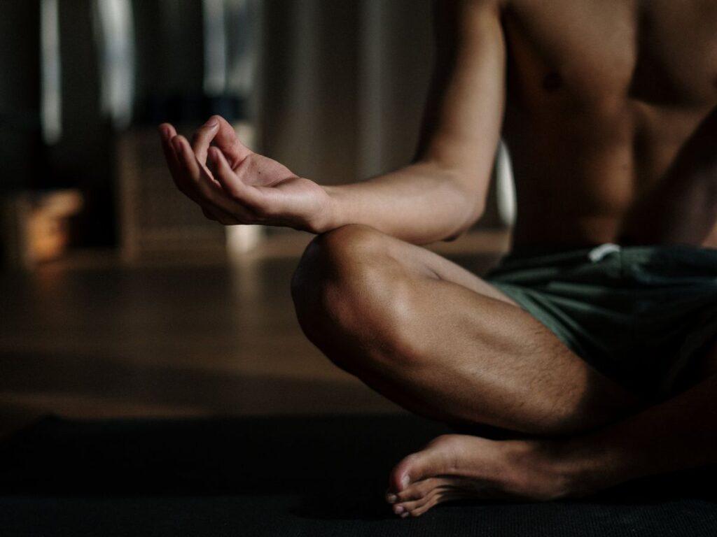 man doing yoga