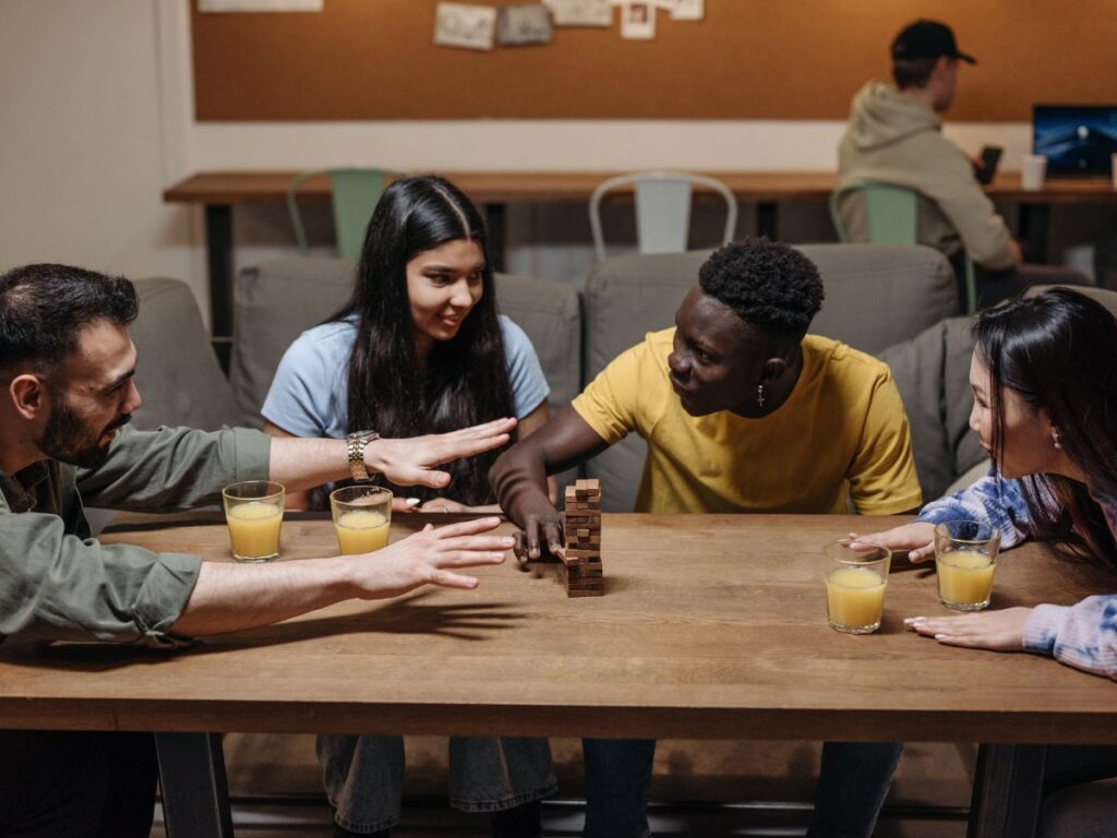 people playing board game