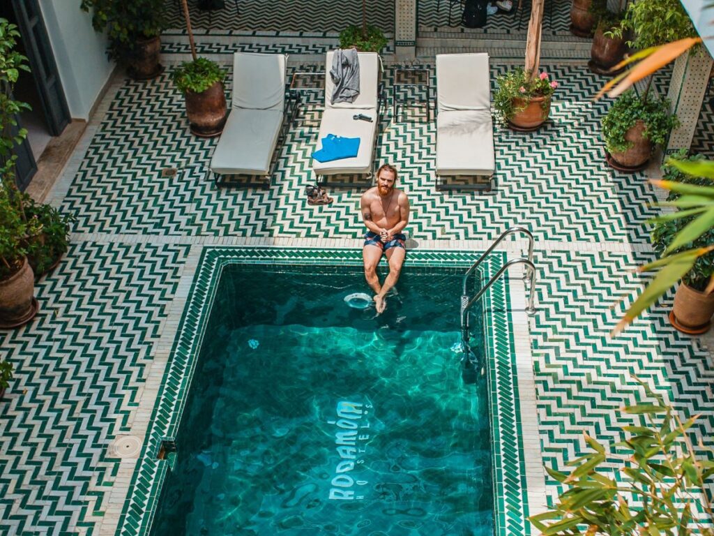 man sitting in a pool