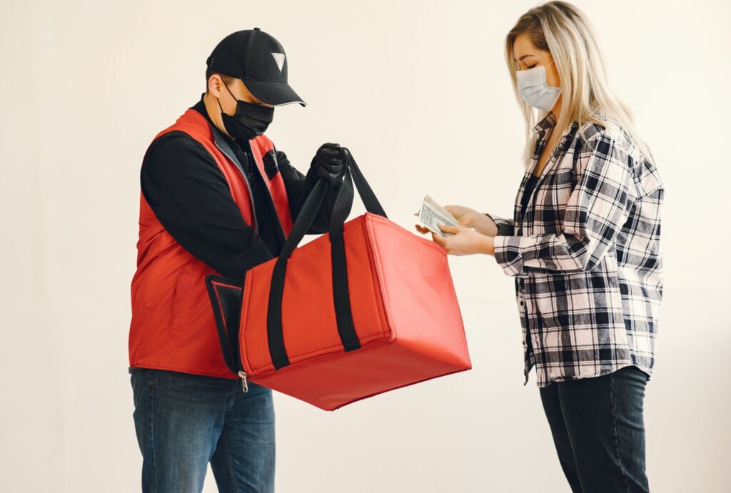 delivery man giving food