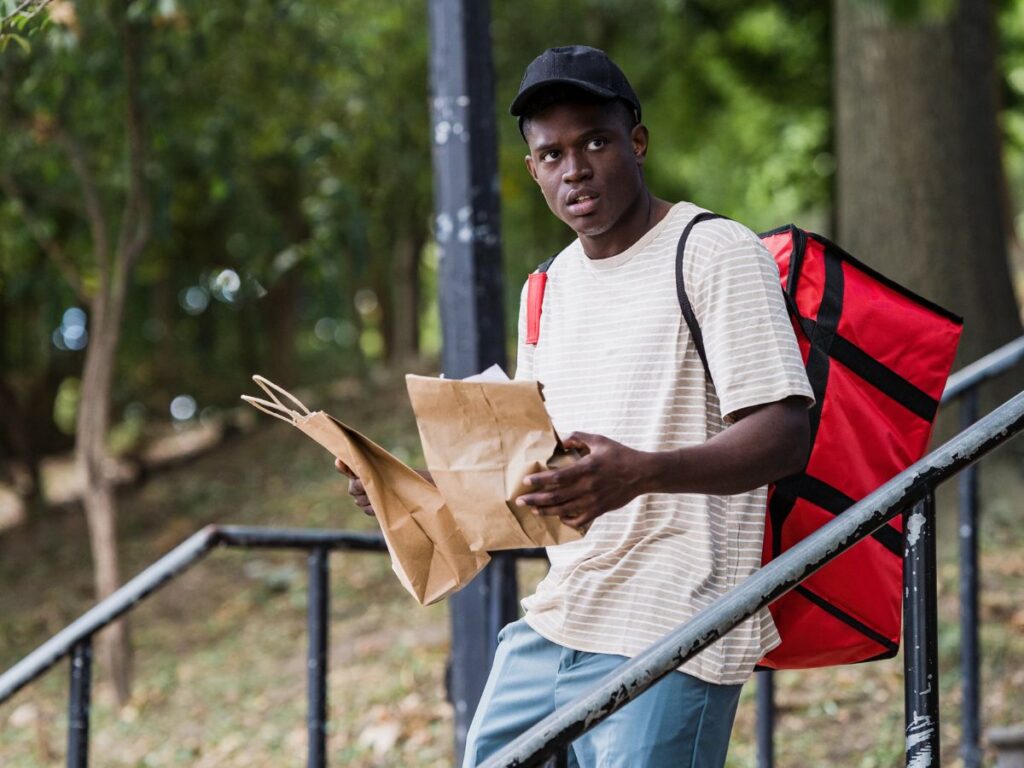 delivery boy with food to be delivered