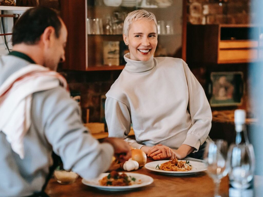 two people having food in a restaurant