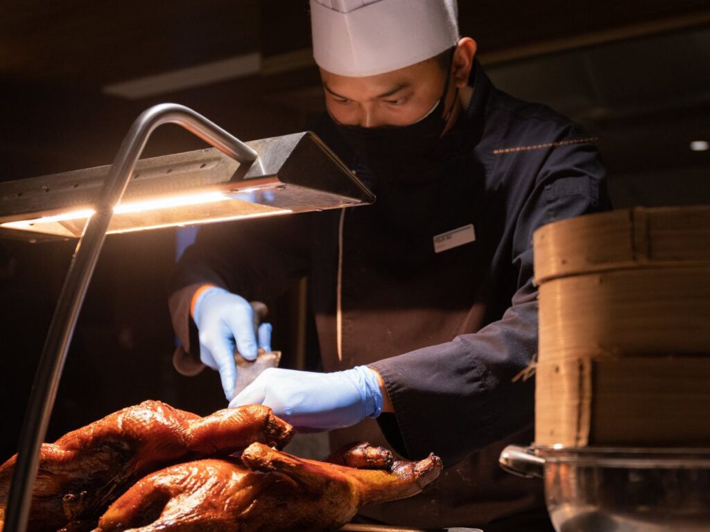 chef cooking peking duck