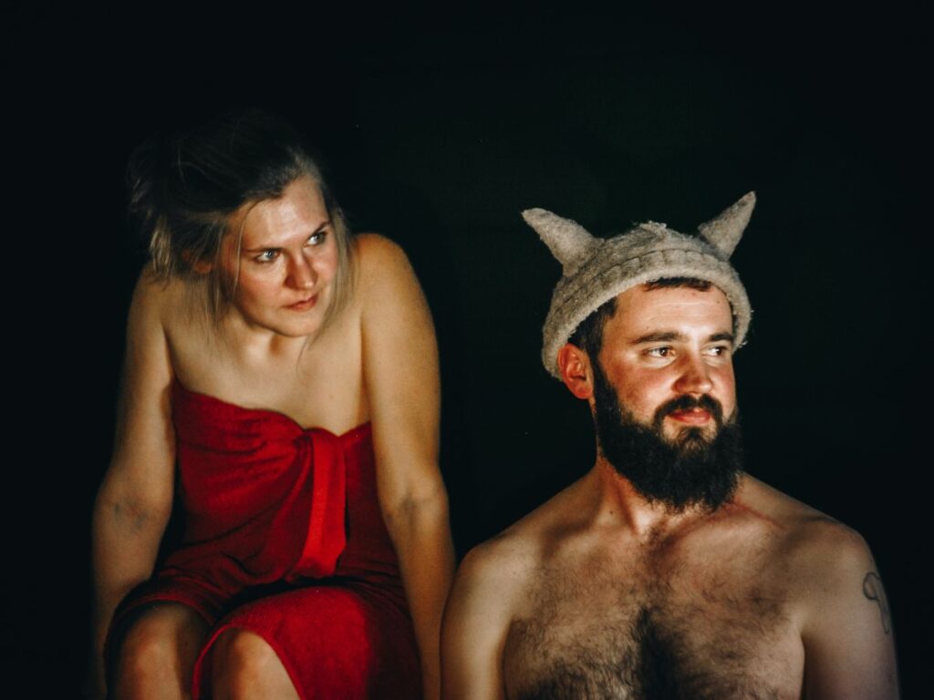man and woman about to get into sauna