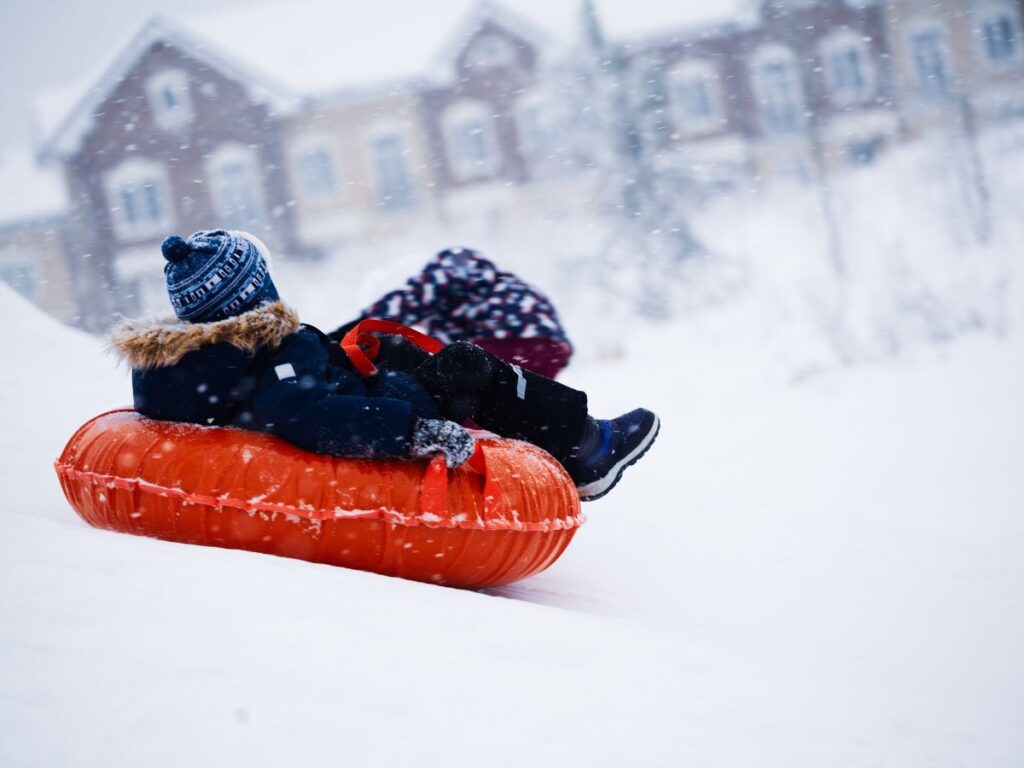 girl snow tubing