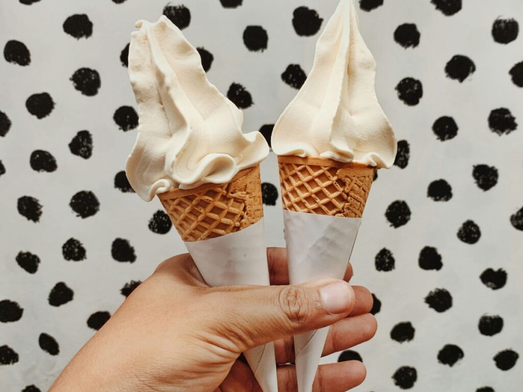 holding ice cream cones