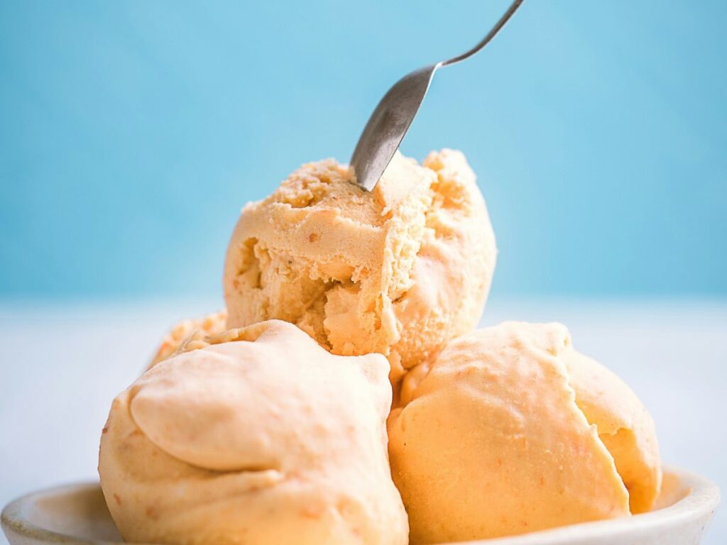 mango ice cream and spoon