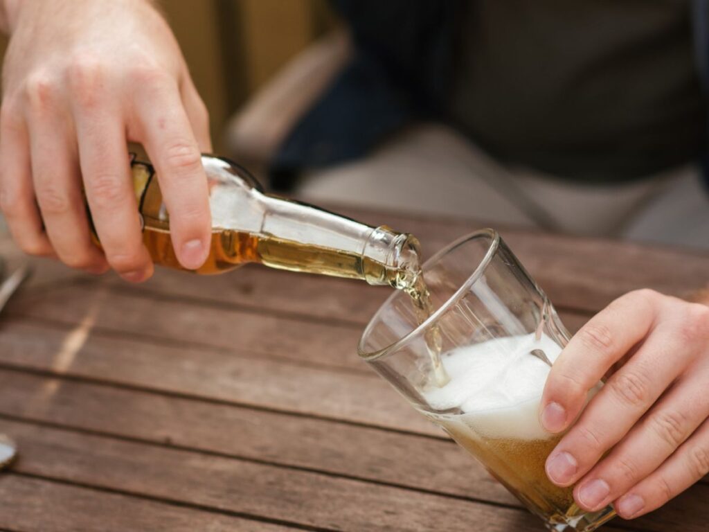 pouring beer in glass