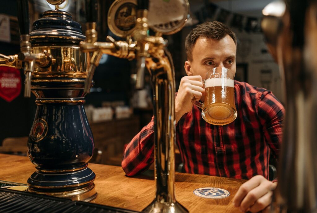 man drinking beer