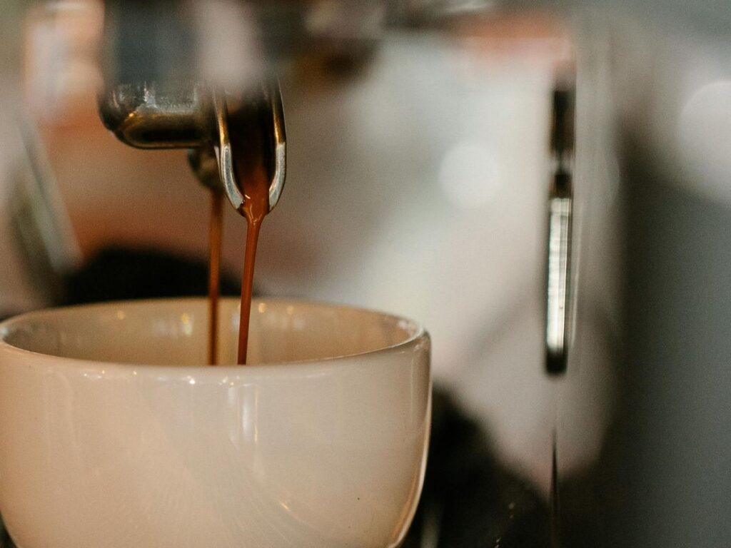 coffee coming out of coffee machine