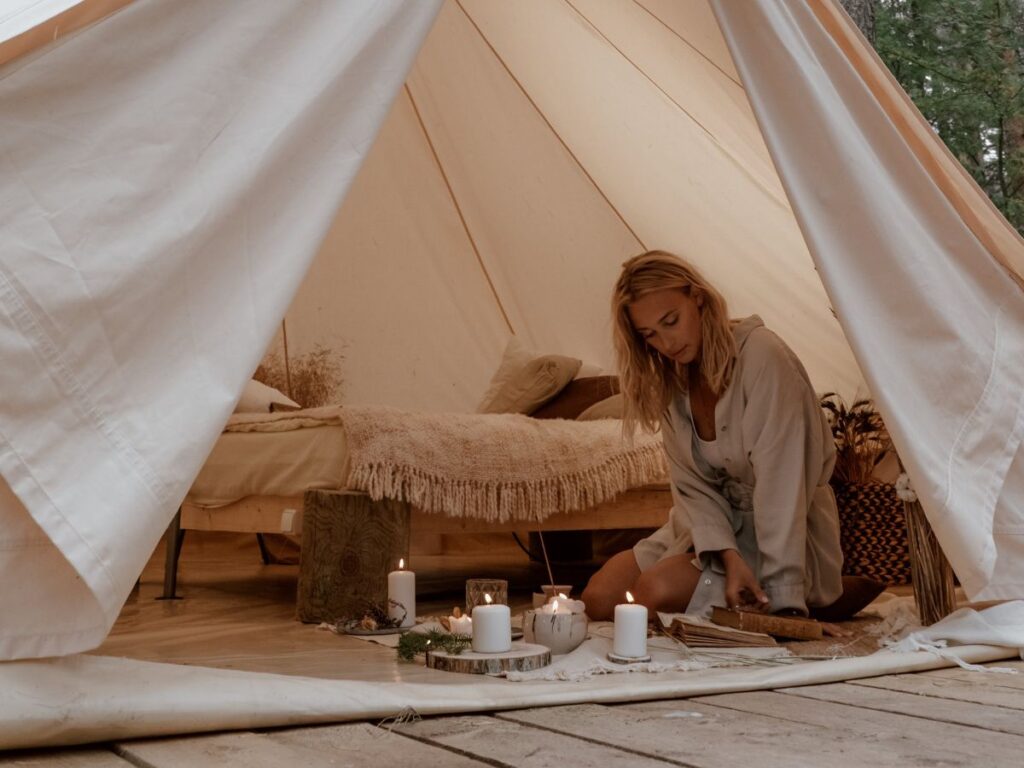 woman relaxing during glamping