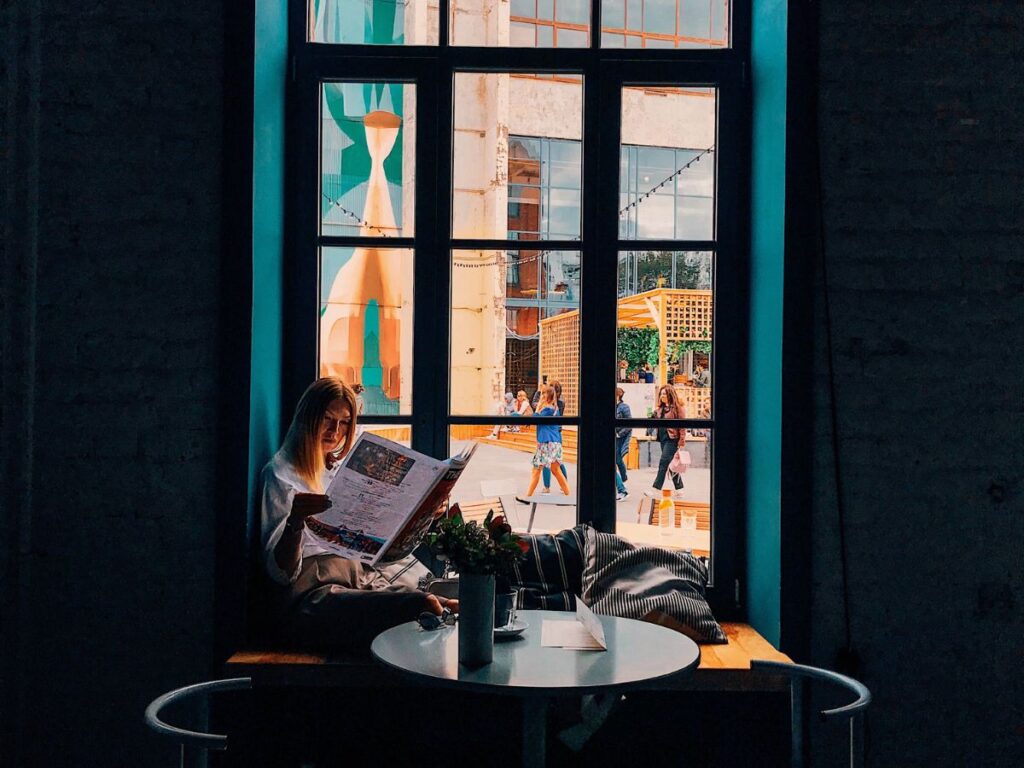 woman reading in a restaurant in unionville