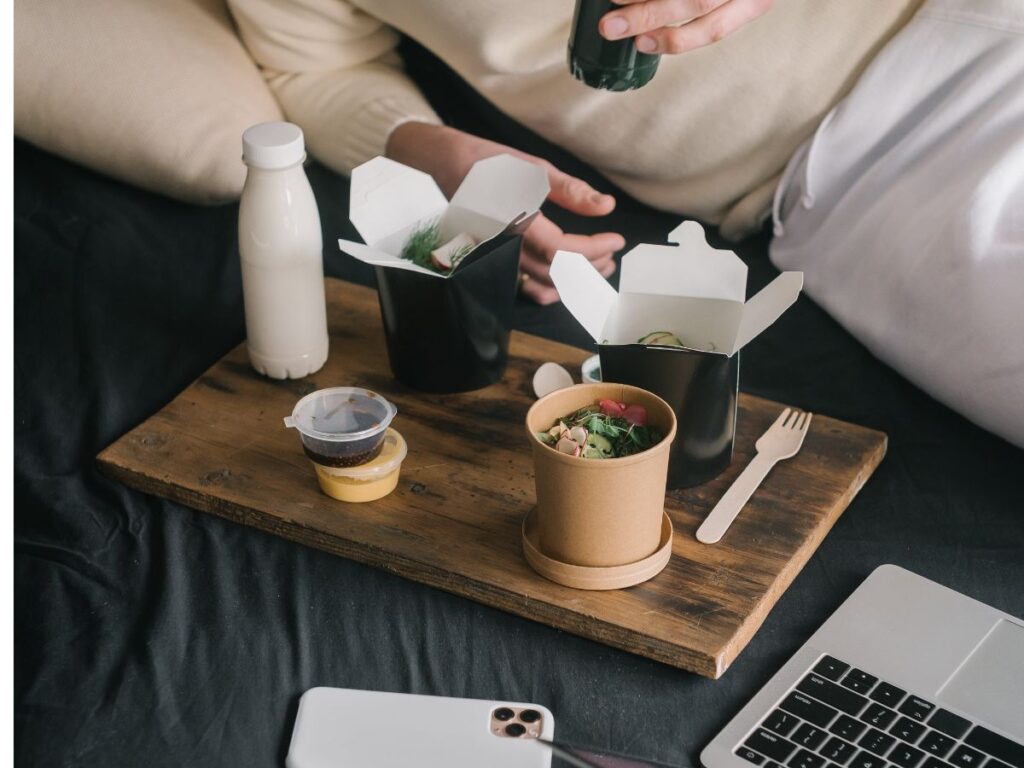 enjoying takeout food at home