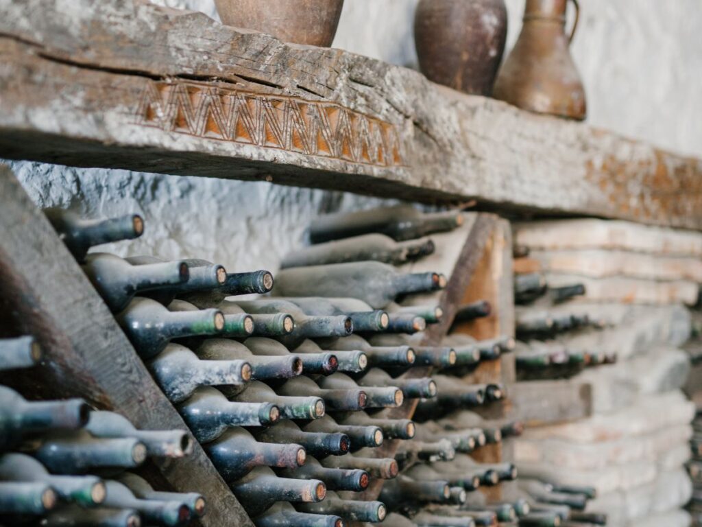 wine bottles in shelf in a winery