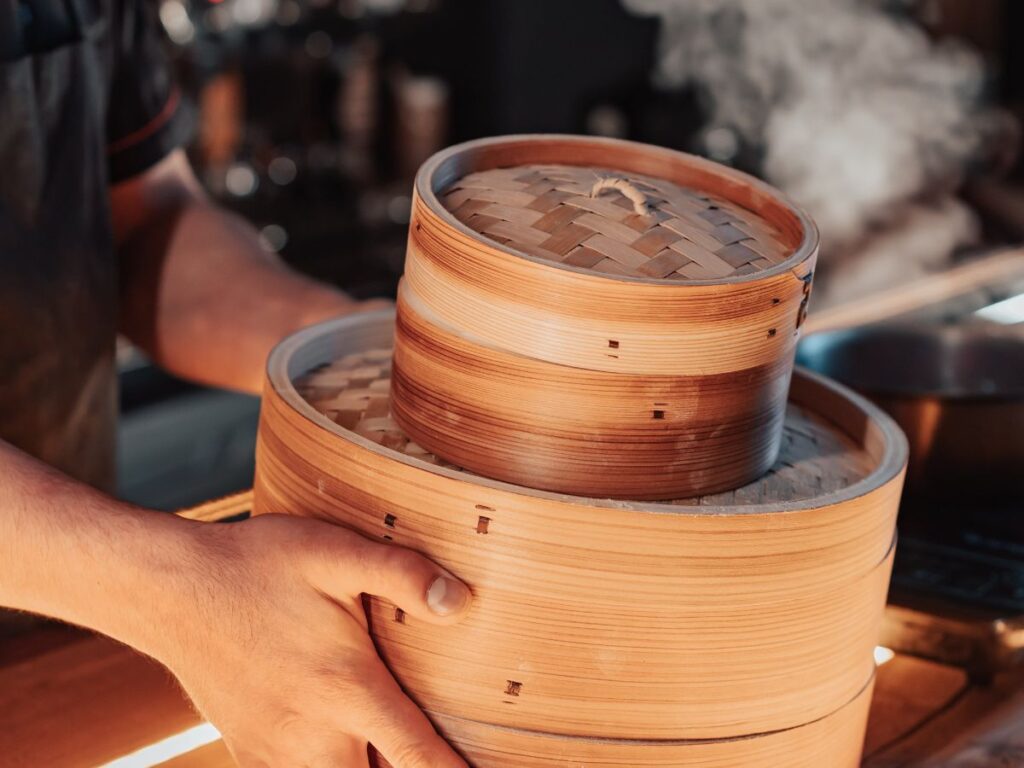 giving boxes of dumplings