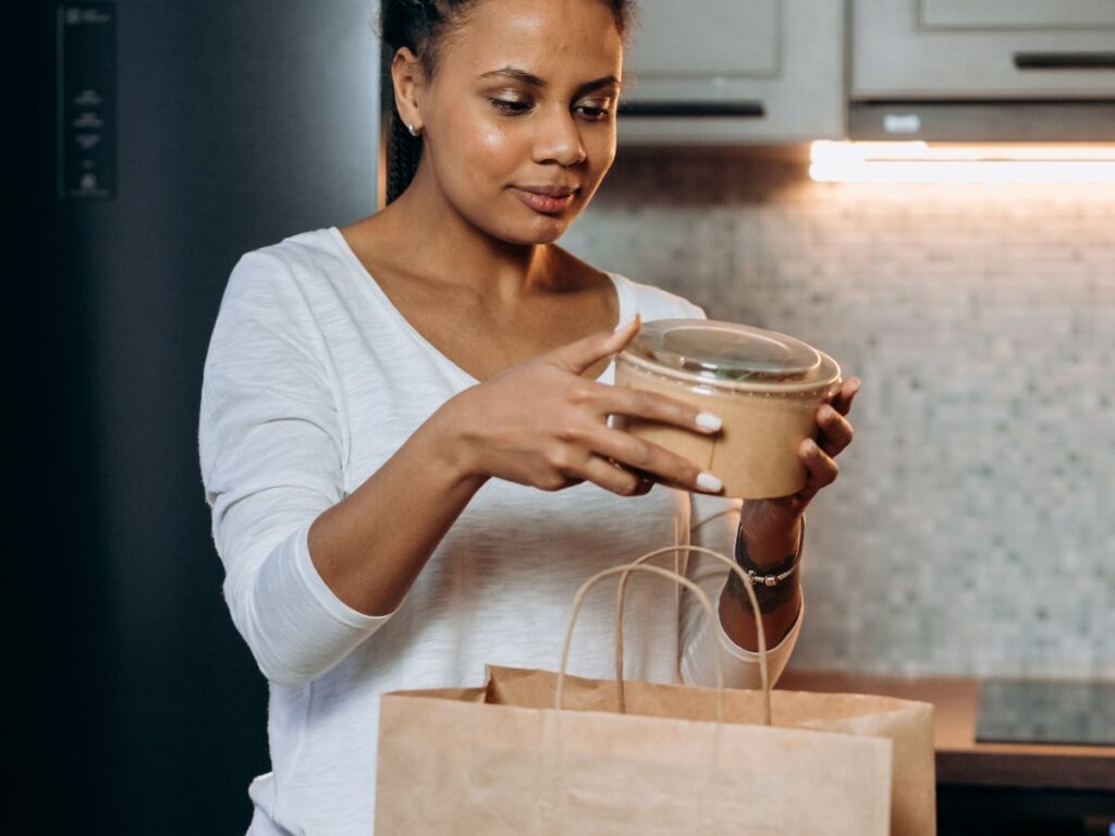 taking boxed food out of bag