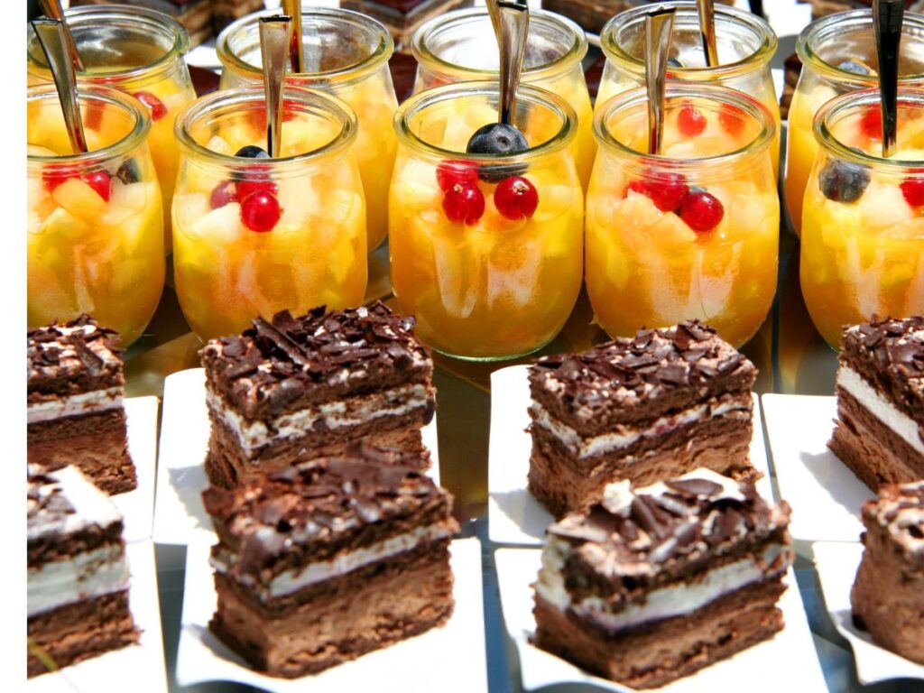 mango dessert and chocolate brownies arranged
