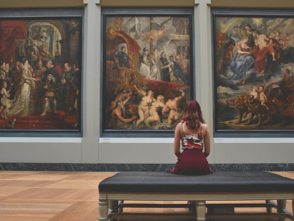 girl sitting in art gallery 