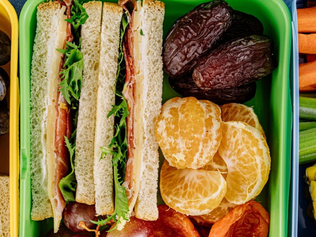 sandwich with fruits in a lunch box
