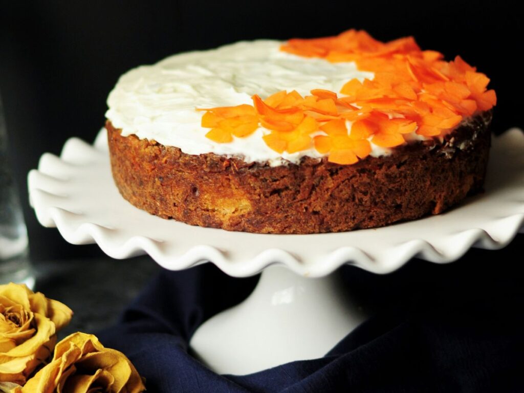 carrot cake being decorated