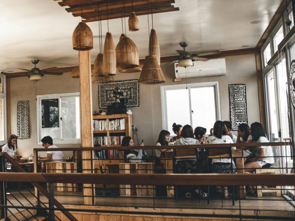 group of girls having food in a restaurant