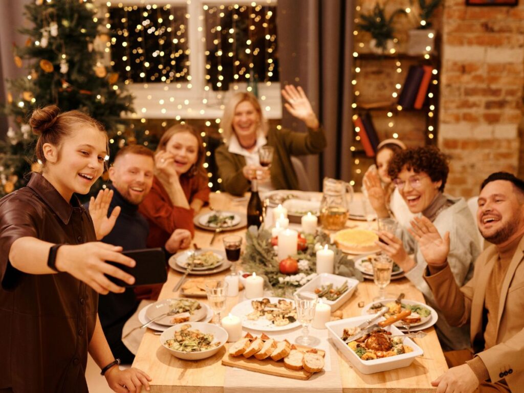 family taking selfie on a holiday dinner