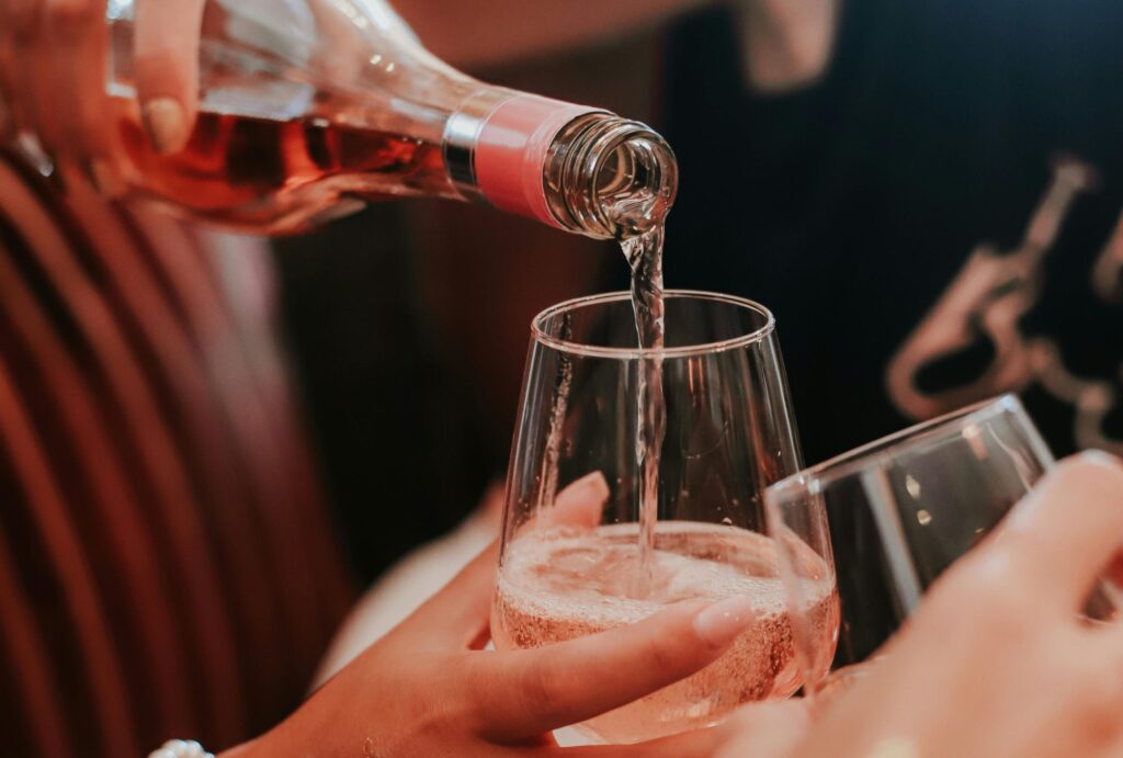 pouring wine in a wine glass