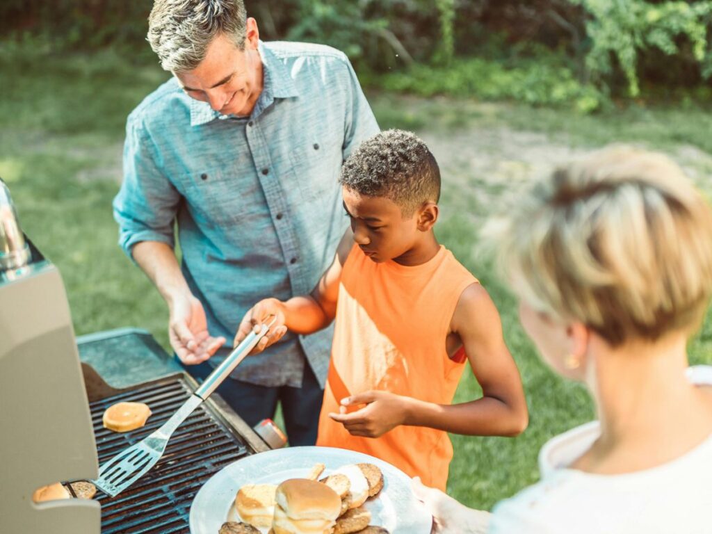 kids helping with the bbq