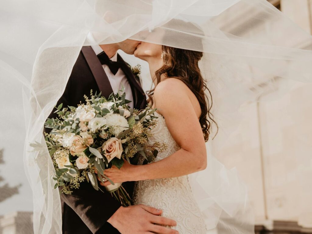 bride and groom kissing