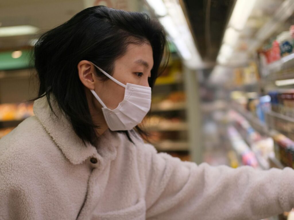 asian woman doing grocery