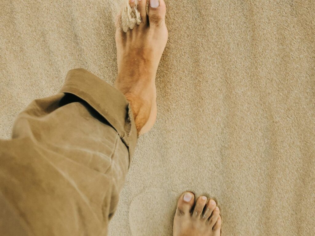 man walking on beach