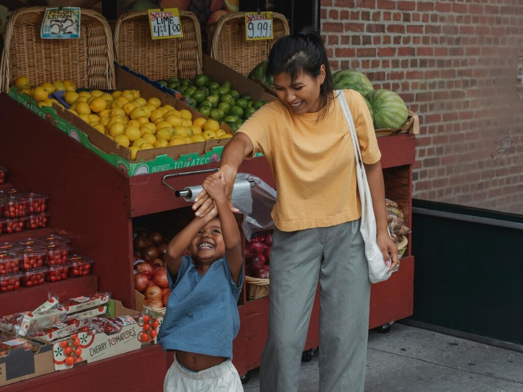 woman and her child in a market