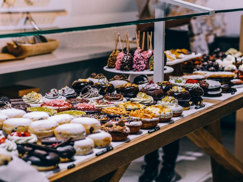 donuts and other bakery items on display