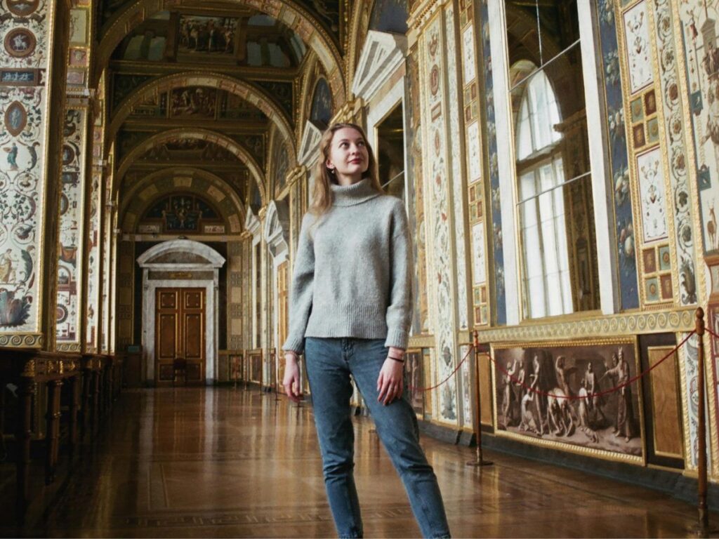 girl posing in a historical building
