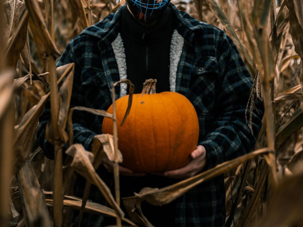 man holding a pumpkin