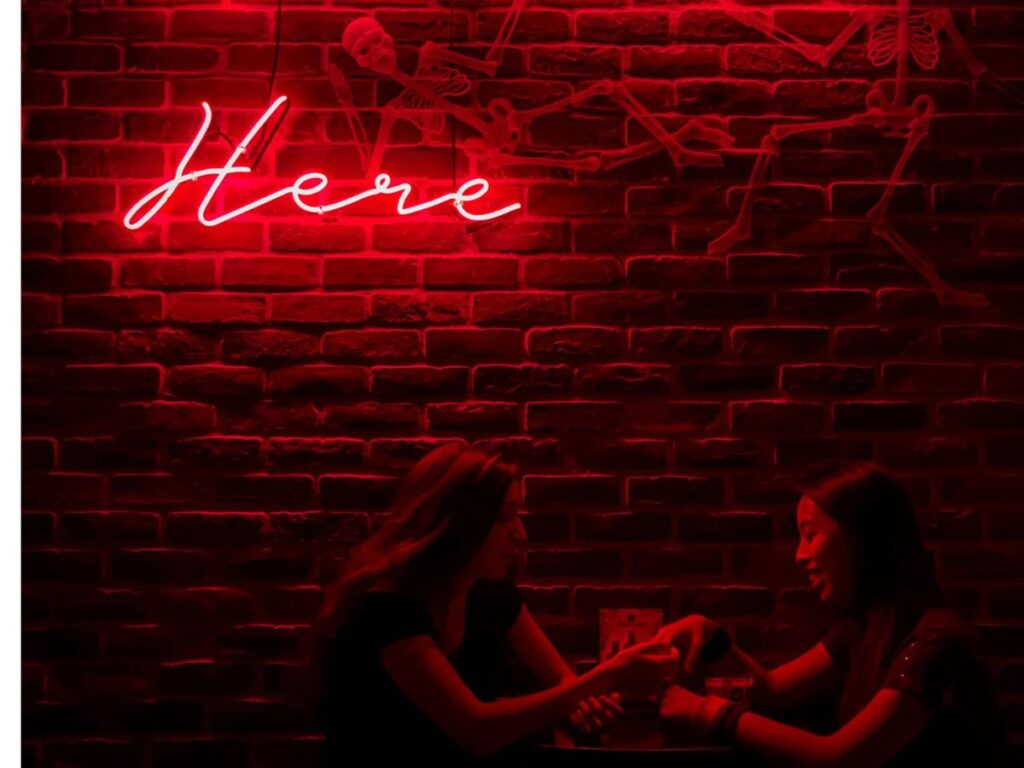 girls sitting in a romantic bar