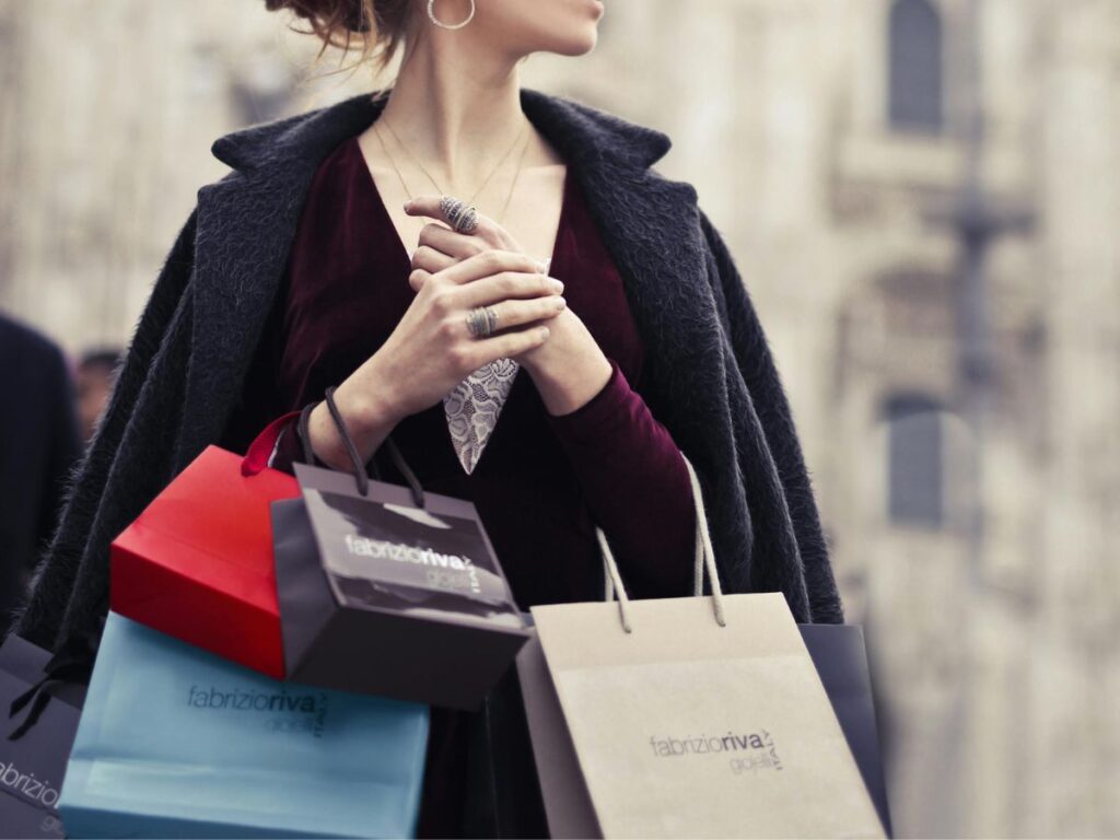 woman carrying shopping bags