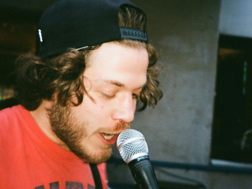 man singing in mic