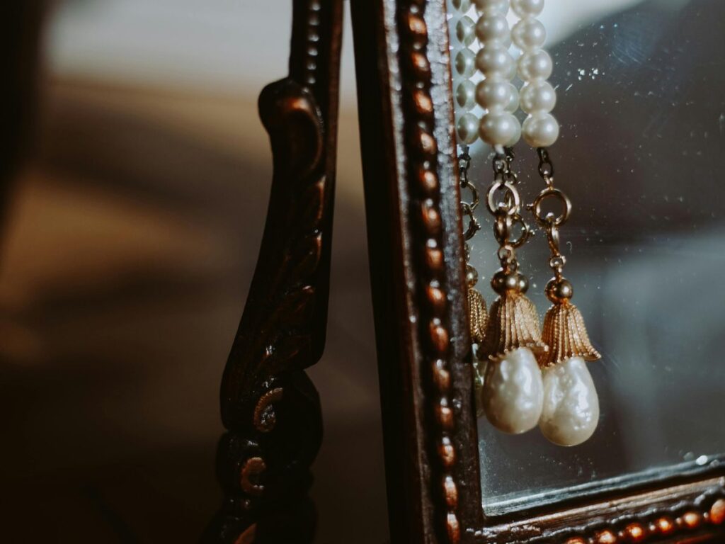 vintage necklace on mirror